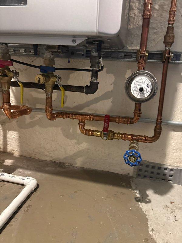 Responded to a cold water crossover issue in the early morning. Inspected the existing copper piping system in the basement utility area, including the water heater connections, shut-off valves, and distribution lines. Addressed the crossover condition affecting the cold water supply, performed necessary repairs to the plumbing configuration, and verified proper isolation between hot and cold water systems to restore normal operation.