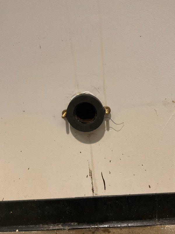 Responded to a commercial men's restroom for a clogged urinal that was not resolved during the initial service visit. Upon inspection, determined that the wall-mounted urinal requires complete removal from the wall to properly address the obstruction. Documented the existing installation, including the flush valve assembly and mounting configuration, and recommended scheduling a follow-up appointment to remove the fixture and clear the blockage.