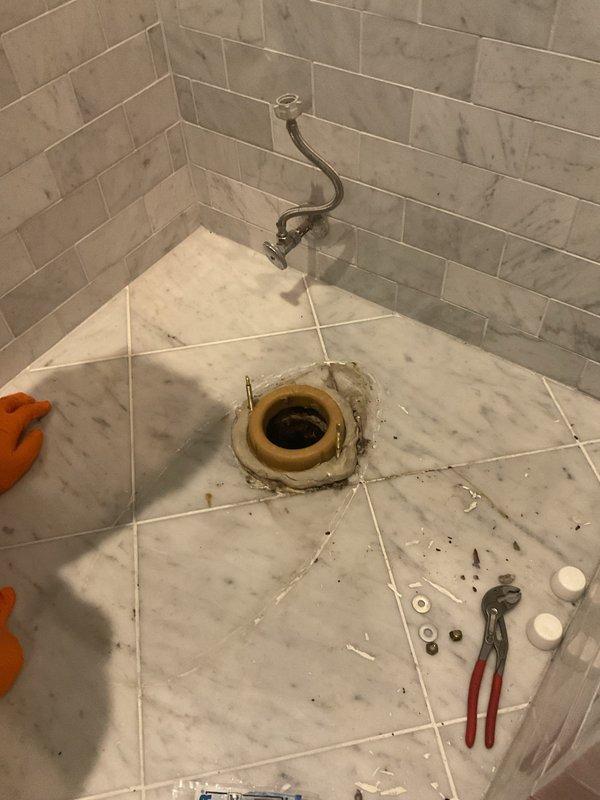 Responded to service call for leaking toilet with suspected wax ring failure. Upon inspection, removed toilet from flange, confirmed deteriorated wax ring as source of leak, and replaced with new wax seal. Reinstalled toilet, ensuring proper alignment and secure mounting to floor flange, then tested for leaks and verified proper operation and flush function.