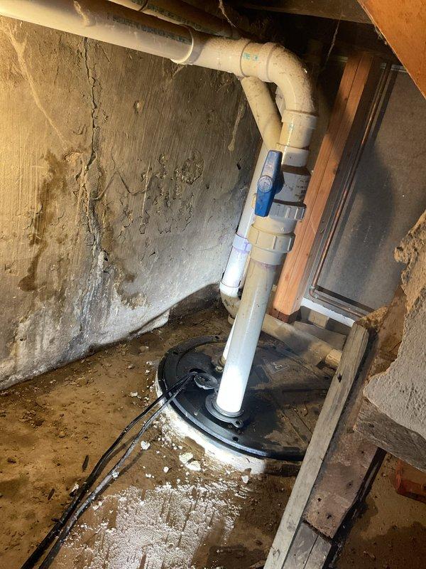 Completed installation of new tanked water heater in basement utility area. Installed unit includes proper water supply connections with copper piping, pressure relief valve configuration, and shut-off valves at base of tank for maintenance access. All plumbing connections were secured and tested for proper operation.