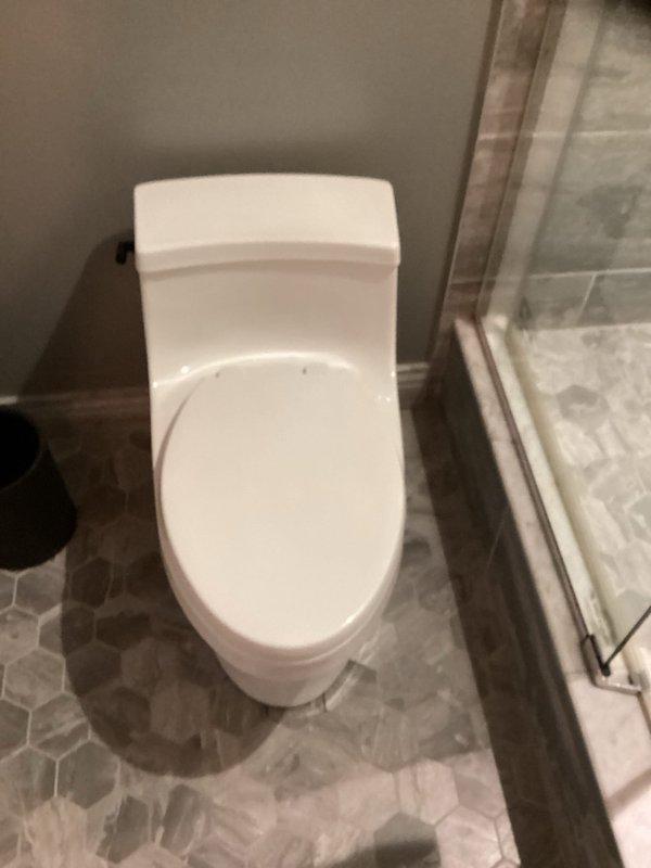 Responded to priority service call for toilet leak issue. Upon inspection, found severely corroded and rusted toilet flange with compromised wax ring seal. Removed toilet from flange, confirmed wax ring failure as source of leak. Replaced deteriorated wax ring with new seal and reinstalled toilet to proper specifications. Verified secure mounting and tested for leaks to ensure proper operation.