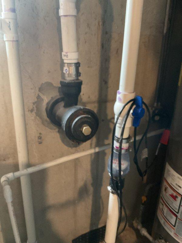 Responded to outdoor faucet leak that had been ongoing for approximately two months in a 60-year-old residential property. Upon inspection, identified the leak originating at the outdoor spigot connection point. Accessed the interior shut-off valve and associated plumbing components located in the utility area behind the exterior wall. Replaced the defective outdoor faucet assembly and installed a new frost-free sillcock with proper sealing at the wall penetration. Verified all interior connections were secure and tested the system for proper operation and complete leak elimination.