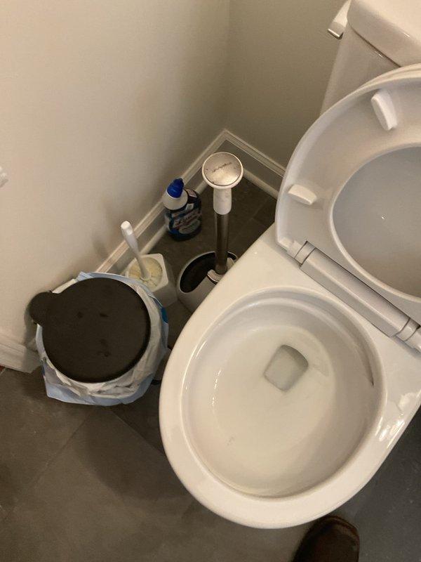 Responded to service call for TOTO toilet experiencing progressively worsening low flow condition over the past month. Upon arrival, performed visual inspection of toilet assembly and surrounding plumbing fixtures. Diagnosed restricted water flow issue affecting flush performance. Inspected tank components, fill valve, flush valve assembly, and rim jets for mineral buildup or obstructions. Cleared blocked rim jets and siphon jet to restore proper water distribution during flush cycle. Verified adequate water level in tank and proper float adjustment. Tested flush performance multiple times to confirm full restoration of flow and bowl evacuation. Toilet now operating at manufacturer specifications with complete flush cycle and proper bowl refill.