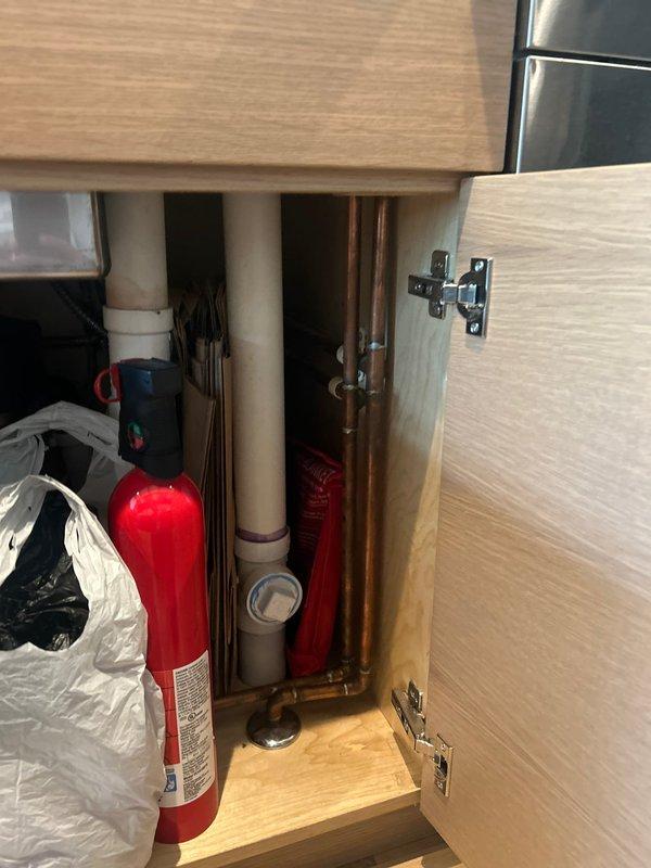 Successfully installed Aquasana point-of-use water filtration systems at two kitchen sink locations in a five-year-old residential property. Mounted filter housings and brackets to cabinet walls beneath sinks, connected inlet and outlet water lines to existing plumbing infrastructure, and verified proper water flow and system operation at both locations.