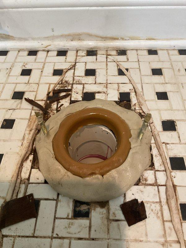Responded to service call for toilet leaking from base due to failed wax ring seal. Upon arrival, removed toilet from flange and confirmed deteriorated wax ring as source of water leakage. Cleaned and prepared toilet flange and floor surface, removing old wax residue and debris. Installed new wax ring seal, reset toilet onto flange, secured with mounting bolts, and tested for proper seal and functionality. Verified no active leaks present after completion.