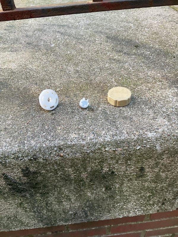 Replaced defective anti-siphon valve cap on outdoor spigot that was causing water to spray during hose operation. Removed failed components and installed new cap assembly to restore proper function and eliminate leakage at the valve body.