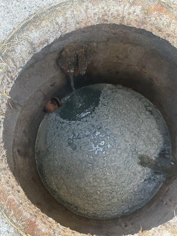 Responded to customer report of kitchen sink backing up into dishwasher. Upon inspection, identified drainage issue affecting the kitchen sink and dishwasher discharge line. Accessed the plumbing system beneath the kitchen sink cabinet, inspecting the P-trap, garbage disposal connection, and associated drain lines. Cleared the clog in the drain line to restore proper water flow and eliminate the backup condition. Verified proper drainage operation and confirmed the dishwasher drain connection was functioning correctly without further backflow issues.