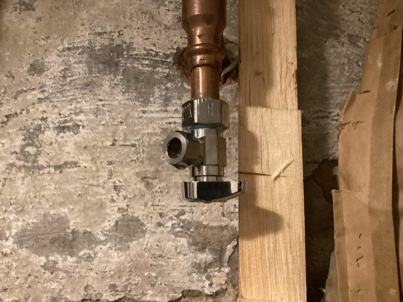 Responded to warranty call for outdoor spigot leaking after seasonal reactivation. Diagnosed failed ball valve with compromised internal seals and O-ring deterioration caused by freeze-thaw cycle damage. Removed defective brass valve assembly from copper supply line and installed new ball valve with proper sealing components to restore leak-free operation.