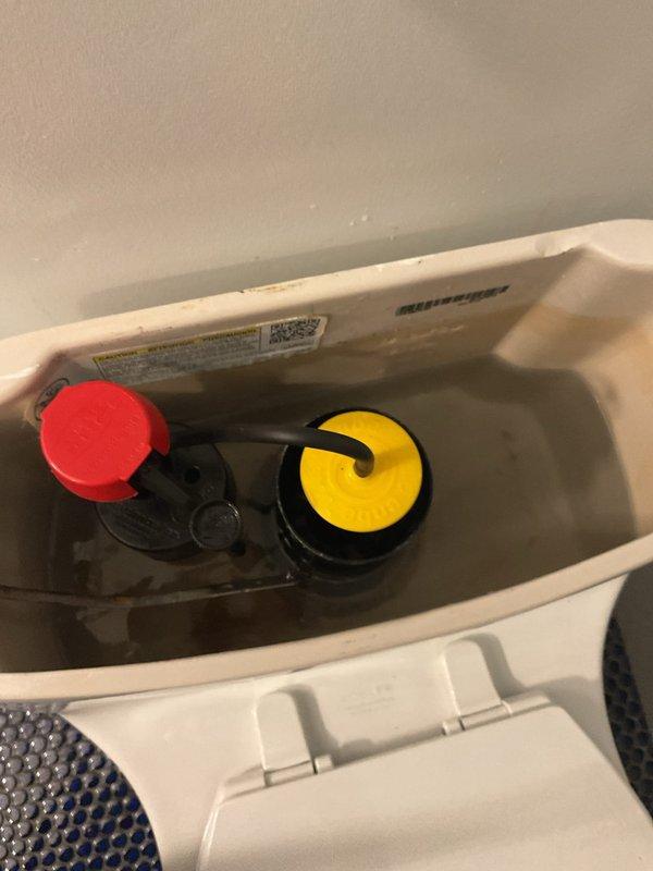 Responded to service call for non-functioning toilet. Upon inspection, removed tank lid and assessed internal flushing mechanism components including fill valve and flush valve assembly. Identified issue with flush system operation, performed necessary repairs to restore proper flushing function. Verified toilet operation and confirmed system working correctly before completing service.