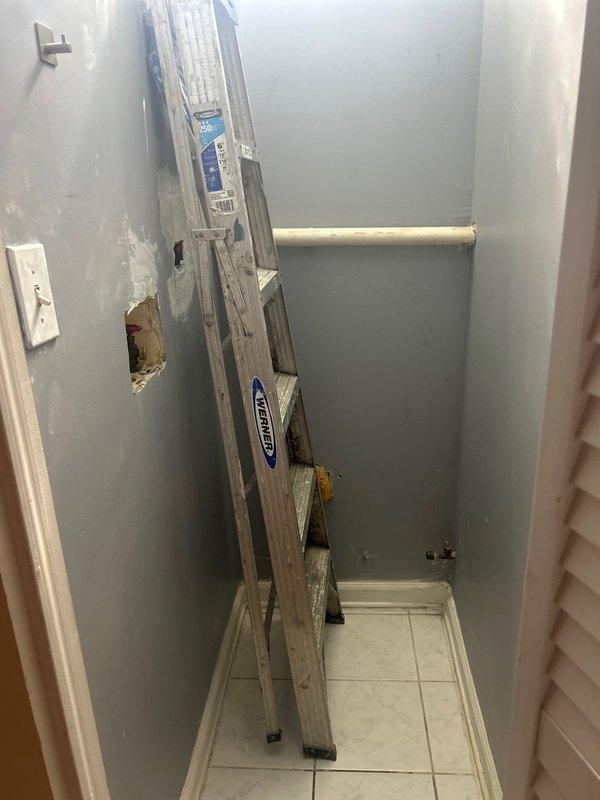 Completed plumbing estimate for laundry drain and vent relocation in a 3-story condo remodel. Assessed existing drainage and vent piping located 8-10 feet from proposed new closet location, evaluated routing requirements through wall cavities with exposed framing, and determined scope for rerouting copper and PVC plumbing lines to accommodate relocated laundry fixtures.