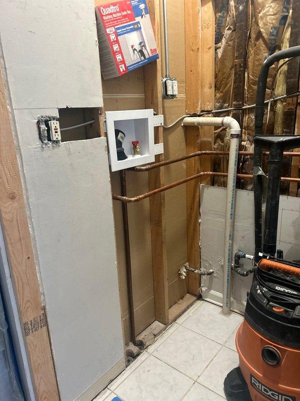 Completed plumbing estimate for laundry drain and vent relocation in a 3-story condo remodel. Assessed existing drainage and vent piping located 8-10 feet from proposed new closet location, evaluated routing requirements through wall cavities with exposed framing, and determined scope for rerouting copper and PVC plumbing lines to accommodate relocated laundry fixtures.