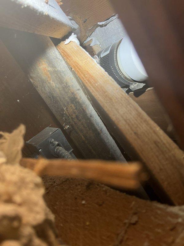 Conducted comprehensive residential drain and sewer system evaluation, including visual inspection of bathroom plumbing fixtures and assessment of accessible crawl space areas above living spaces. Documented existing plumbing infrastructure conditions, photographed shower enclosure, toilet installation, and overhead drainage routing through attic space to provide accurate estimate for potential drain and sewer service needs.