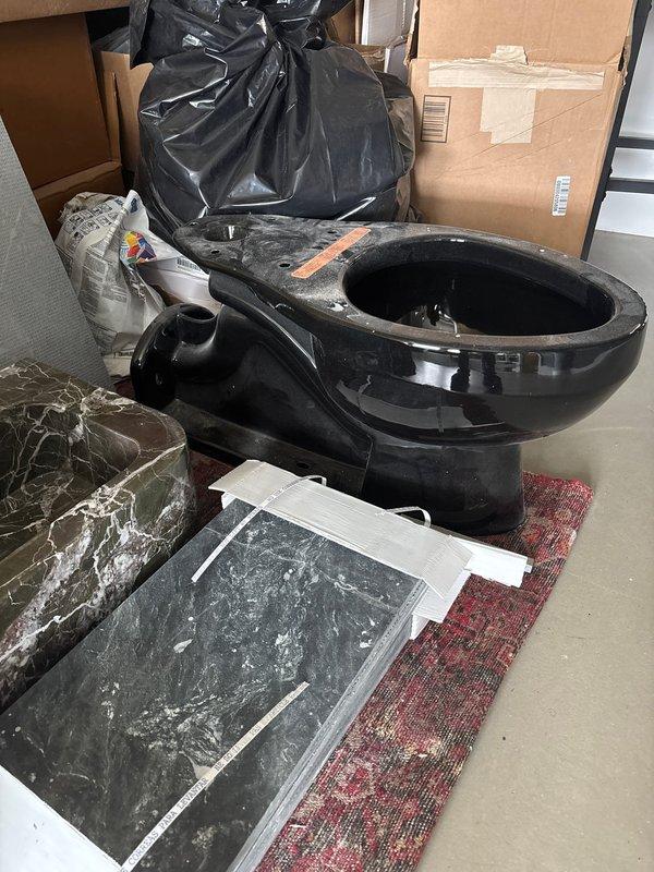 Responded to service call at multi-unit building for toilet replacement. Removed existing toilet that was leaking and disposed of old fixture. Successfully installed customer-supplied new toilet, ensuring proper seal with new wax ring, secure floor mounting, and leak-free water supply connection. Tested unit for proper operation and verified no leaks present.