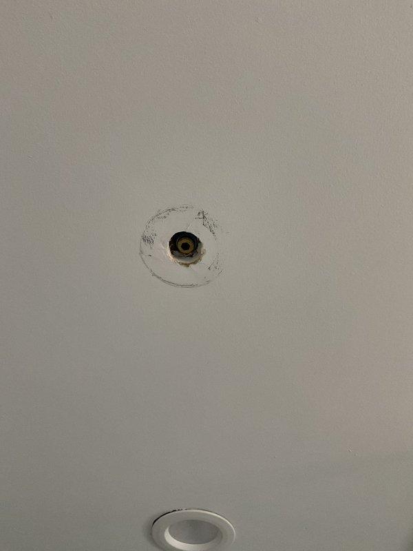 Responded to service call for shower head that detached from wall in recently renovated bathroom. Upon inspection, found improper installation of shower arm with insufficient anchoring into wall structure. Removed existing shower arm and assessed wall cavity for damage. Installed proper blocking and secured new shower arm with appropriate mounting hardware to ensure secure attachment. Tested water flow and verified no leaks at connection points. Confirmed proper alignment and stability of shower head assembly before completing work.