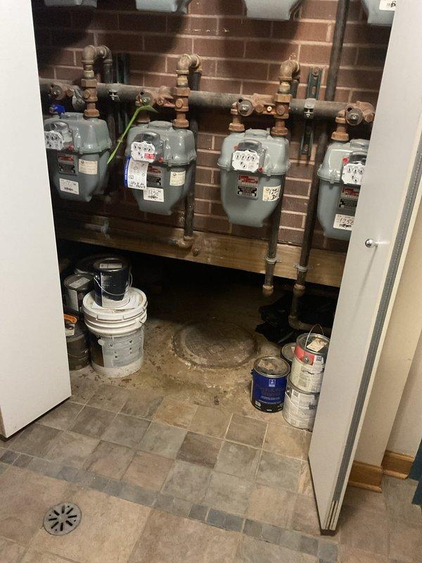 Dispatched pump truck for scheduled three-hour commercial drain service at multi-unit facility. Accessed underground sewer system via concrete access port in crawl space area and serviced utility room drain system near gas meter installation. Successfully cleared blockage and restored proper drainage function to commercial plumbing system.