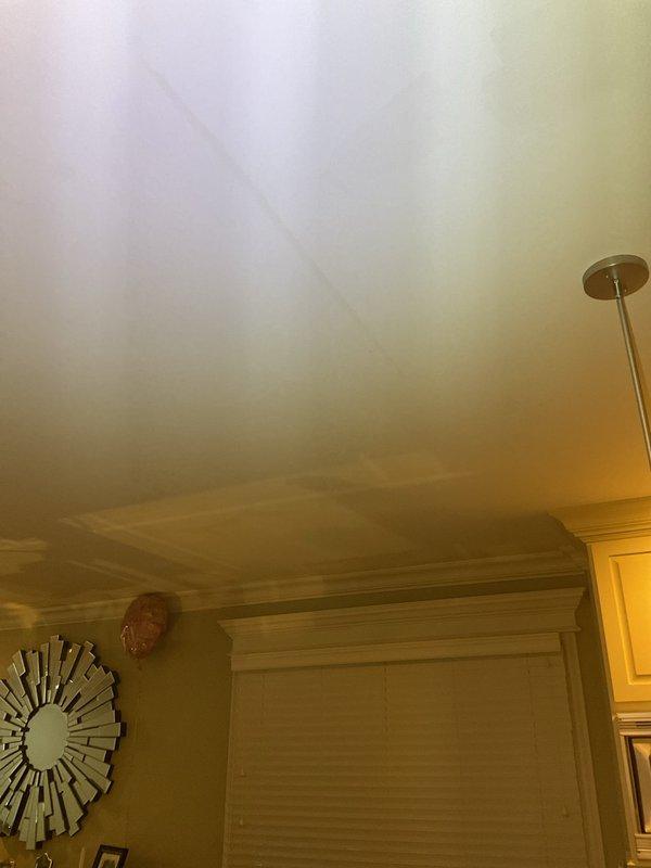 Performed Level 1 diagnostic leak investigation in residential kitchen area as scheduled priority appointment. Inspection included ceiling, walls, and cabinetry surrounding sink and plumbing fixtures to identify source of reported water intrusion. Investigation required two-person crew to complete thorough assessment of affected areas and plumbing systems.