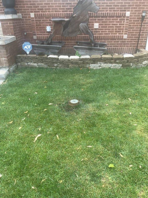 Responded to service call regarding intermittent odors in multiple areas of the residence suspected to be related to plumbing drainage issues. Conducted comprehensive inspection of the plumbing system to assess drain lines and water flow toward the main sewer connection. Inspected exterior drainage fixtures and interior bathroom drain systems, including floor drain in tiled bathroom area, to identify potential blockages or venting problems that could cause sewer gas infiltration into the living space.