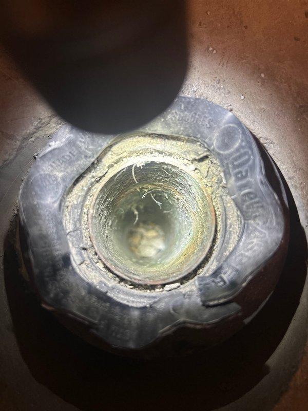 Installed two new Kohler shower valves: a ½" pressure balancing valve with push button diverter in the master bathroom and a Kohler Rite-Temp ½" pressure balancing valve in the hallway bathroom. Roughed in plumbing for both bathrooms to accommodate new shower arms, tub spouts, and trim installations. In the master bathroom, opened wall access to upgrade from single sink vanity to double sink configuration, splitting existing drain line into two separate drains and dividing water supply lines to serve dual fixtures.
