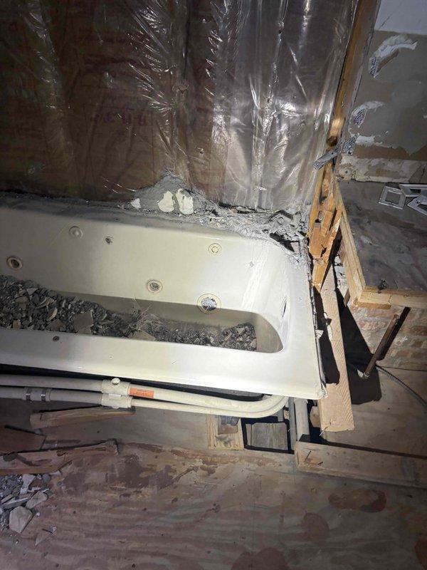 Completed comprehensive plumbing estimate for exposed wall piping replacement and updates in basement/crawl space area. Assessed existing white PVC drainage and waste lines, evaluated structural access points through exposed wooden framing, and documented current infrastructure conditions including proximity to HVAC ductwork, insulation barriers, and mechanical systems for coordinated installation planning.