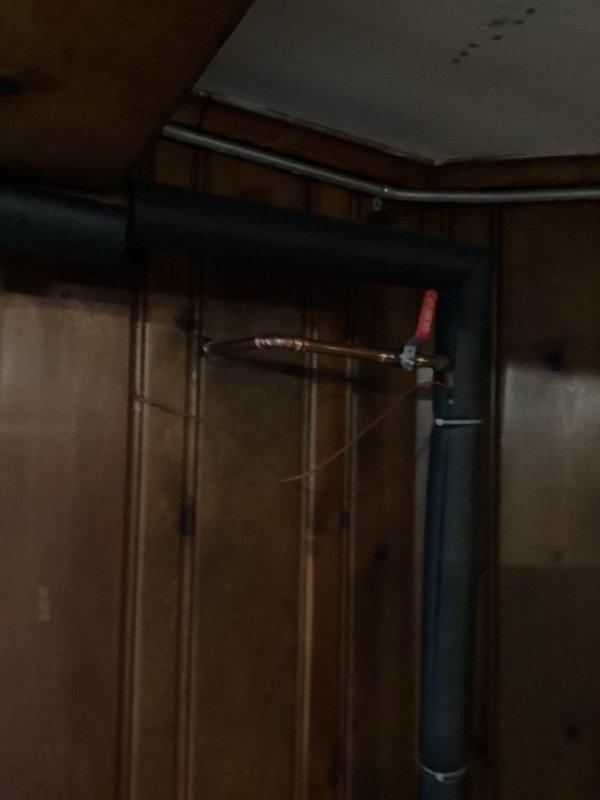 Performed routine maintenance flush on tankless water heater system in basement mechanical room. Isolated unit and circulated descaling solution through heat exchanger to remove mineral buildup and sediment accumulation. Flushed system with clean water, verified proper flow rates, and confirmed unit operational status. Inspected all copper supply lines, gas connections, and venting components for integrity. System tested and returned to normal operation with no issues identified.