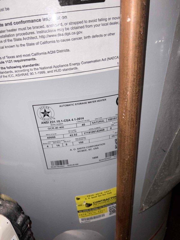 Conducted on-site assessment of existing A.O. Smith 40-gallon atmospheric vent gas water heater in basement mechanical room. Documented current installation including copper supply and discharge piping connections, venting configuration, and proximity to electrical panel and HVAC equipment. Photographed unit specifications and serial number for estimate preparation. Customer requesting pricing for potential future replacement, no immediate service work authorized at this time.