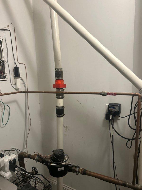 Completed consultation for whole house water treatment system installation on main water line. Assessed existing plumbing infrastructure including main line connections, shutoff valves, and flow meter location to determine optimal placement for sediment and catalytic carbon filtration units. Evaluated under-sink plumbing configuration for installation of point-of-use fluoride filter system. Documented current pipe routing, electrical access points, and mechanical room layout to develop comprehensive installation plan for multi-stage water treatment system.