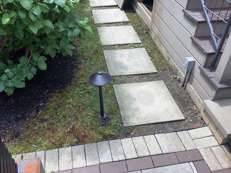 Replaced defective ball valve on exterior water line accessed through recessed utility box in exterior wall. Restored proper water flow control and verified system operation upon completion.