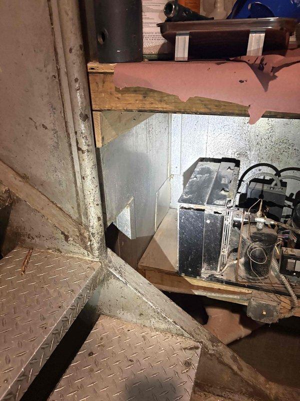 Conducted comprehensive plumbing assessment in basement utility area to evaluate deteriorated PVC piping system requiring replacement. Documented existing conditions of main drainage lines, utility sink connections, and mechanical room plumbing infrastructure through photographic evidence. Prepared detailed estimate for large-diameter PVC pipe replacement, including evaluation of copper supply lines, drain connections, and integration with existing water heater and utility sink systems in the mechanical space.
