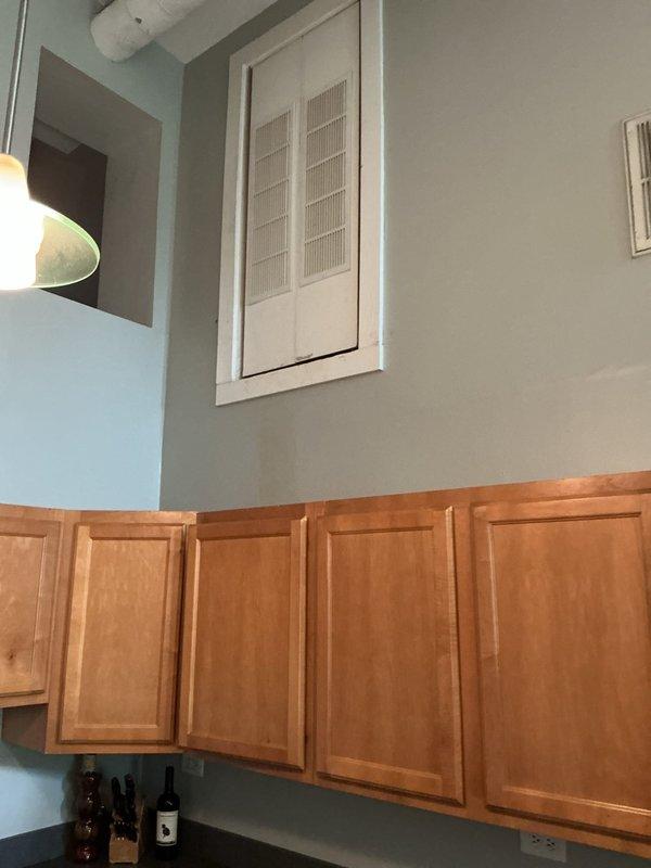 Conducted residential drain and sewer estimate for kitchen plumbing modification. Assessment revealed need to relocate drain line approximately one-quarter inch to accommodate cabinet or appliance installation requirements. Documented existing plumbing configuration and spatial constraints in kitchen area with vaulted ceilings and exposed ductwork to determine feasibility and scope of drain repositioning work.