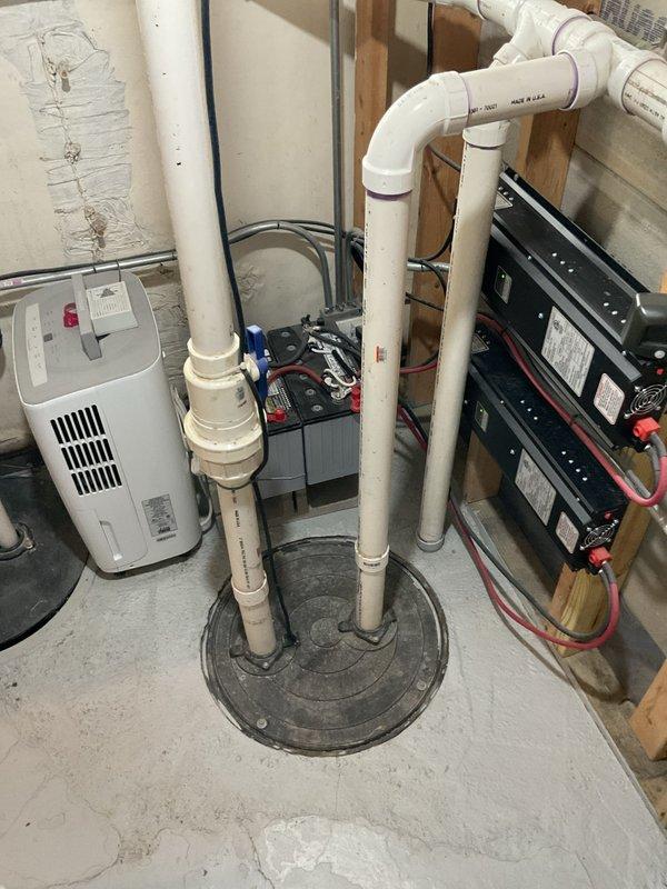 Responded to service call for failed water heater. Upon inspection, found a 9-year-old Bradford White Defender Safety System tank-type water heater installed in the basement utility area that was no longer functioning. The unit, originally installed in September 2017, had reached the end of its serviceable life. Documented the existing installation, including the water heater's condition, surrounding plumbing connections with brass fittings and pressure relief valves, and the utility room configuration with sump pump system and electrical equipment. Provided customer with detailed estimate for water heater replacement, including removal of the existing failed unit and installation of new equipment with proper connections and code-compliant safety devices.