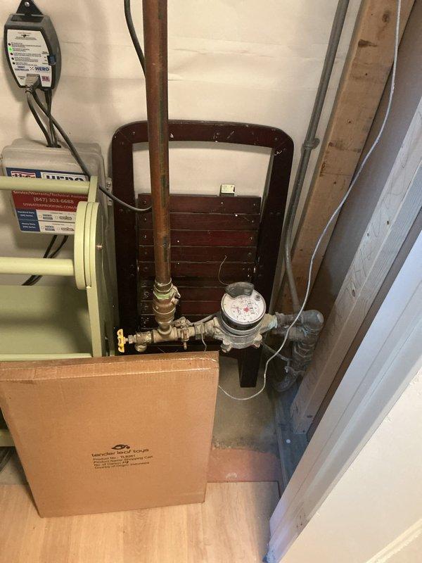 Responded to copper piping issue in kitchen of 15-year-old residential property. Performed comprehensive repipe service, replacing deteriorated copper supply lines throughout affected areas. Installed new copper piping with proper support and insulation, integrated with existing HVAC system components in attic space. Verified all connections at water meter, pressure gauge, and main shutoff valves for proper flow and pressure. System tested and confirmed operational with no leaks detected.