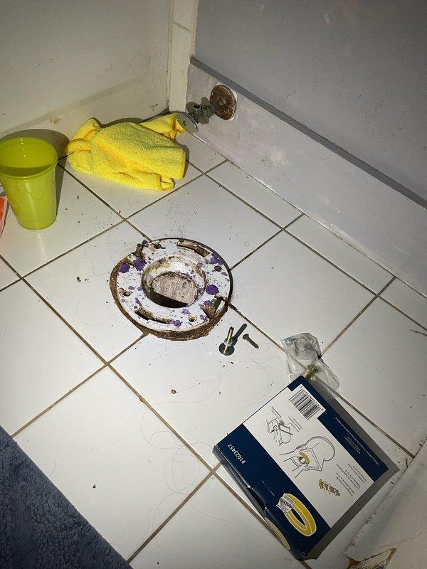 Responded to a rescheduled service call to replace a corroded toilet flange in a residential bathroom. Removed the existing toilet, extracted the deteriorated flange showing significant rust and corrosion around the edges, and prepared the drain opening for new installation. Installed a new toilet flange assembly with proper sealing components, reset the toilet with new wax ring and mounting bolts, and tested for proper function and leak-free operation.