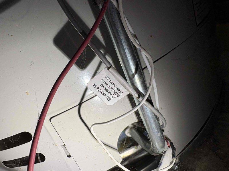 Installed new iCon System control unit for water heater with proper electrical connections and mounting. Replaced compressor or motor component with associated wiring (red, white, and black conductors) and verified all connections were secure and properly labeled.