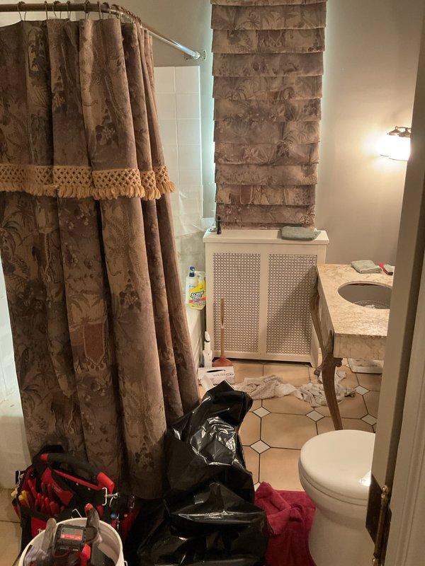 Responded to emergency service call for residential property with two bathrooms experiencing complete drainage blockages. Upon arrival, assessed both affected bathrooms and identified severe clog conditions preventing proper waste water evacuation. Utilized professional drain cleaning equipment and techniques to clear obstructions from main sewer line, restoring full drainage functionality to both bathroom fixtures. All drains tested and confirmed operational upon completion.