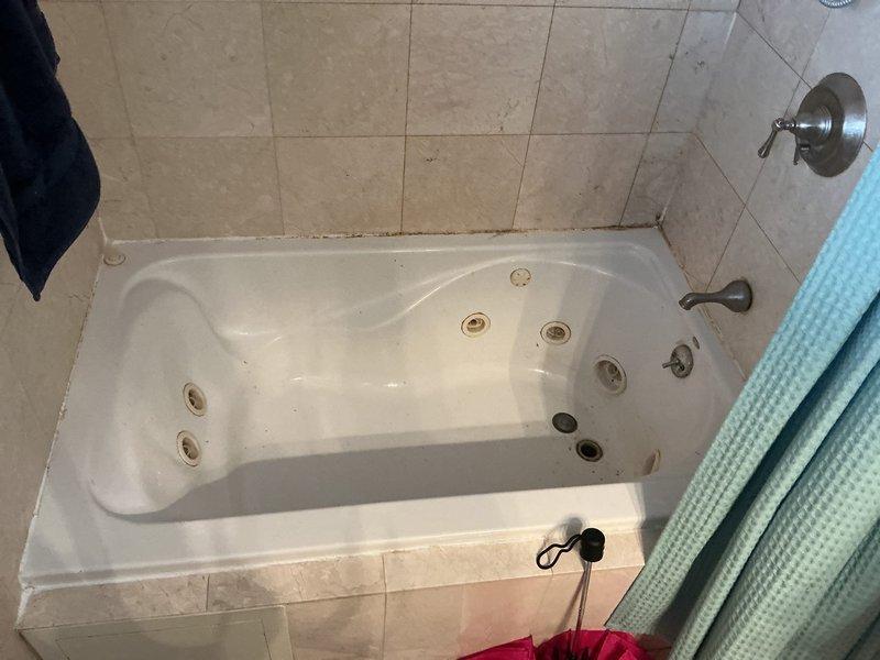 # Drain and Sewer Install - Main Line

Successfully completed main line drain and sewer installation for residential property. The new main line was installed to code specifications, ensuring proper drainage flow from all bathroom fixtures including the jetted bathtub and toilet. All connections were tested and verified for proper operation with no leaks detected.