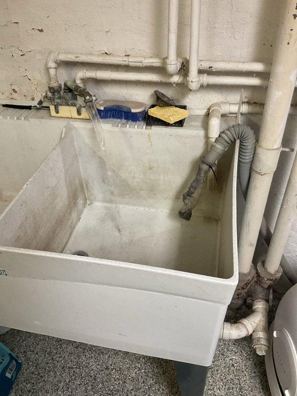 Responded to clogged drain service call requiring rodding of multiple fixtures. Successfully cleared blockages in utility sink drain system and bathroom vanity sink. Disassembled and cleaned pop-up drain assembly in bathroom sink, removing debris and buildup from stopper mechanism and linkage components. Rodded drain lines to restore proper flow and drainage function. All fixtures tested and confirmed operational upon completion.