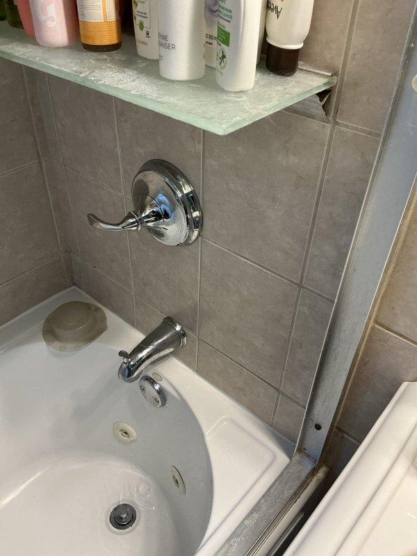 Responded to service call for shower lacking hot water in 1970s-era home where issue had persisted for over a week. Diagnosed faulty shower control valve cartridge that had failed and was preventing hot water flow to the shower while tub spout continued functioning normally. Removed existing chrome shower valve assembly, replaced worn cartridge, tested water temperature control through full range of motion, and verified proper hot water delivery to shower head. System restored to full operational capacity.