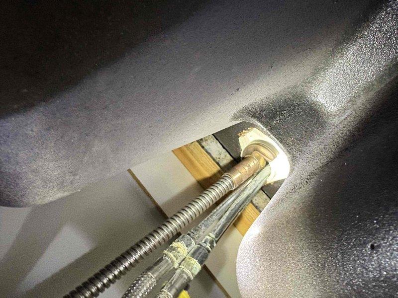 Performed comprehensive plumbing maintenance inspection on 80-year-old residential property. Conducted thorough examination of all accessible plumbing systems, fixtures, and components throughout the home.

Inspected water heater installation, verifying proper mounting hardware, support brackets, and insulation integrity. Examined flexible gas connectors and supply lines for signs of wear, corrosion, or deterioration. Confirmed secure connections and proper clearances within mechanical cabinet.

Evaluated under-sink plumbing configurations, including PVC drainage systems, P-traps, and waste lines. Inspected hot and cold water supply lines with braided stainless steel flex connectors, noting proper color-coded identification clips. Examined all visible pipe connections, fittings, and joints for leaks or potential failure points. Verified drainage hose and vent connections for proper installation and function.

Tested water pressure at multiple fixtures throughout the property. Checked a