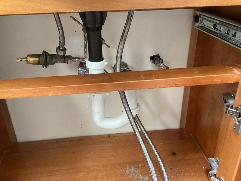 Responded to client request for same-day service and successfully replaced kitchen sink angle stops and P-trap assembly. Removed old fixtures and installed new brass angle stops with braided stainless steel supply lines, along with a complete white PVC P-trap configuration. All connections were tested for proper drainage and leaks, with system functioning correctly upon completion.