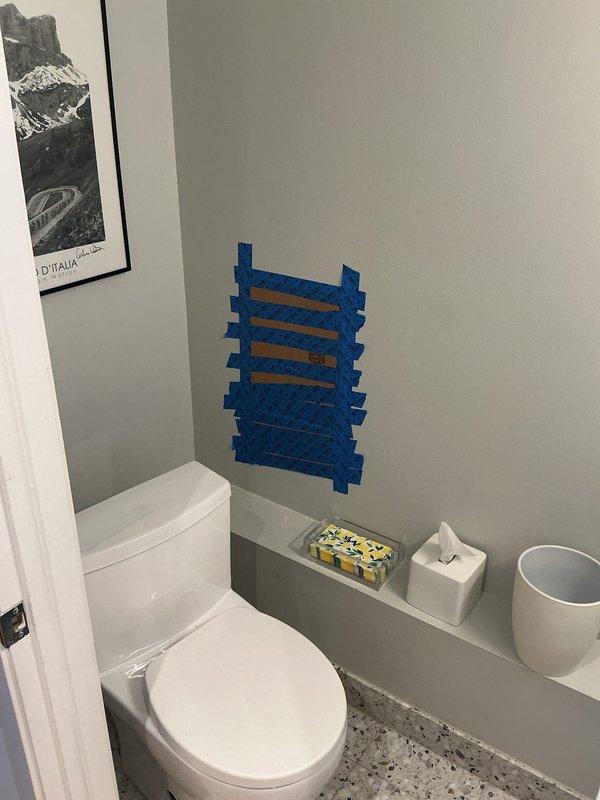 Performed drain and sewer camera inspection service requiring wall access to evaluate plumbing infrastructure. Created access opening in bathroom wall to expose vertical drainage pipes and horizontal supply lines for thorough visual assessment. Documentation completed with photographic evidence of pipe conditions, including PVC drainage system and copper supply lines within wall cavity.