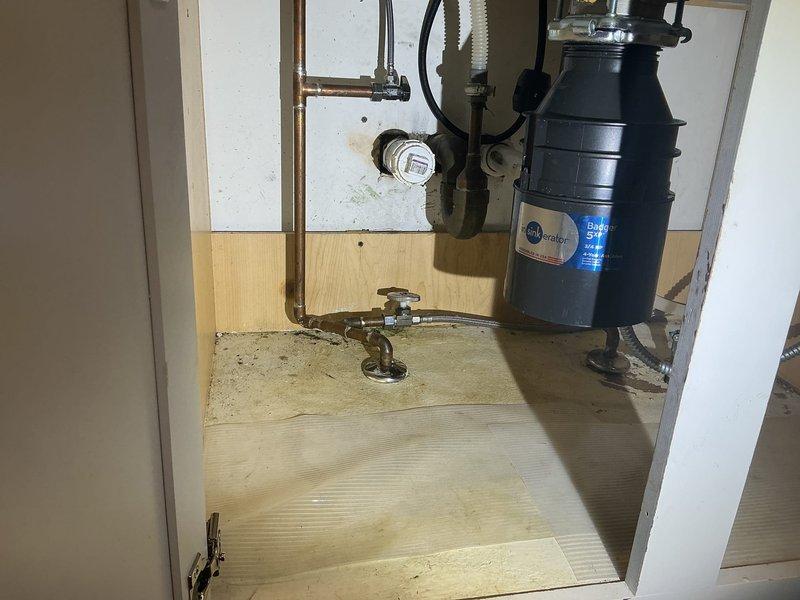 Power rodded and flushed both kitchen drain stacks serving the north and south side first-floor units to clear blockages and restore proper drainage flow. Both stacks were experiencing backup issues, with the north side stack having recurring problems in recent months. Successfully cleared obstructions using power rodding equipment and performed thorough flushing to verify complete restoration of drainage capacity.