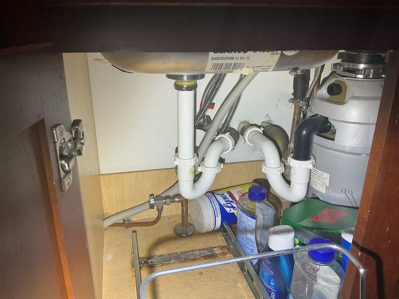 Power rodded and flushed both kitchen drain stacks serving the north and south side first-floor units to clear blockages and restore proper drainage flow. Both stacks were experiencing backup issues, with the north side stack having recurring problems in recent months. Successfully cleared obstructions using power rodding equipment and performed thorough flushing to verify complete restoration of drainage capacity.