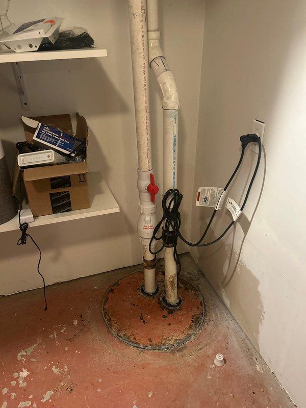 Responded to callback regarding kitchen grease discovered in basement ejector pit. Conducted site assessment of existing plumbing configuration and documented current conditions with photographs. Evaluated kitchen drainage line routing and ejector pit system to determine source of grease infiltration. Discussed re-routing options for kitchen waste line with customer to prevent future grease accumulation in ejector system and provided recommendations for proper drainage separation to maintain system integrity.