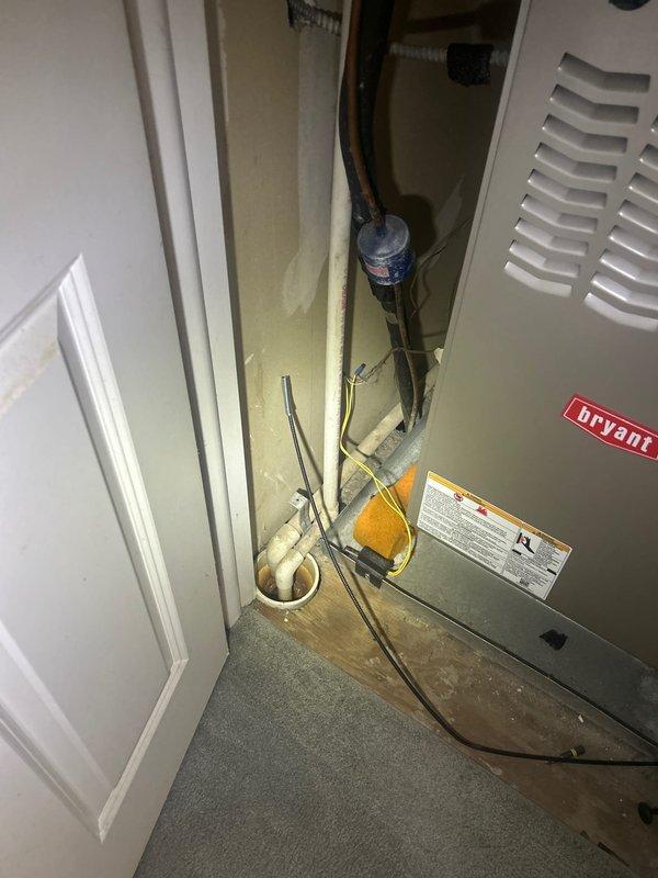 Responded to priority no hot water call and completed installation of new tanked water heater in residential utility closet. Removed and disposed of failed existing unit, installed replacement water heater with proper clearances adjacent to existing Bryant HVAC equipment, connected all supply and discharge piping with brass fittings, verified proper venting, and tested all connections for leaks. Unit commissioned successfully with hot water restored to residence.