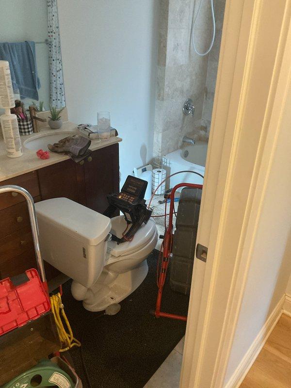 Conducted comprehensive diagnostic evaluation of residential bathroom plumbing system using specialized electronic testing equipment. Performed thorough assessment of toilet functionality, drainage capabilities, and overall sewer line condition. Deployed diagnostic tools including digital monitoring devices and testing apparatus to evaluate system performance and identify potential issues within the drain and sewer infrastructure serving the bathroom fixtures.