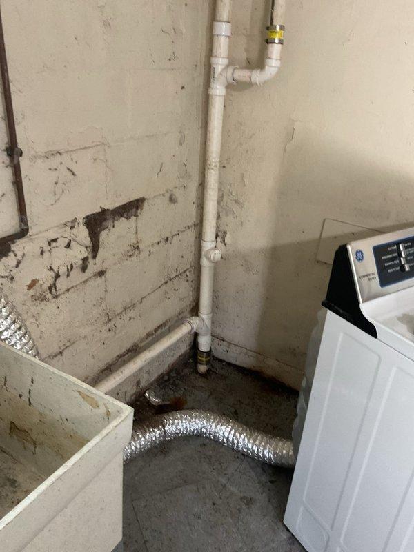 Responded to kitchen sink backup issue. Upon arrival, inspected the drainage system and plumbing infrastructure in the basement utility area beneath the affected fixture. Located and accessed the drain lines running through the floor joists to identify the source of the blockage. Cleared the clog in the kitchen drain line using professional drain cleaning equipment, restoring proper water flow and drainage. Tested the system to verify complete resolution of the backup issue and confirmed all fixtures were draining properly with no residual slow drainage or standing water.