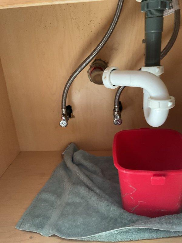 Responded to a clogged bathroom sink call and successfully cleared the blockage. Accessed the P-trap assembly beneath the undermount sink, removed debris causing the obstruction, and verified proper drainage function before completing the service.