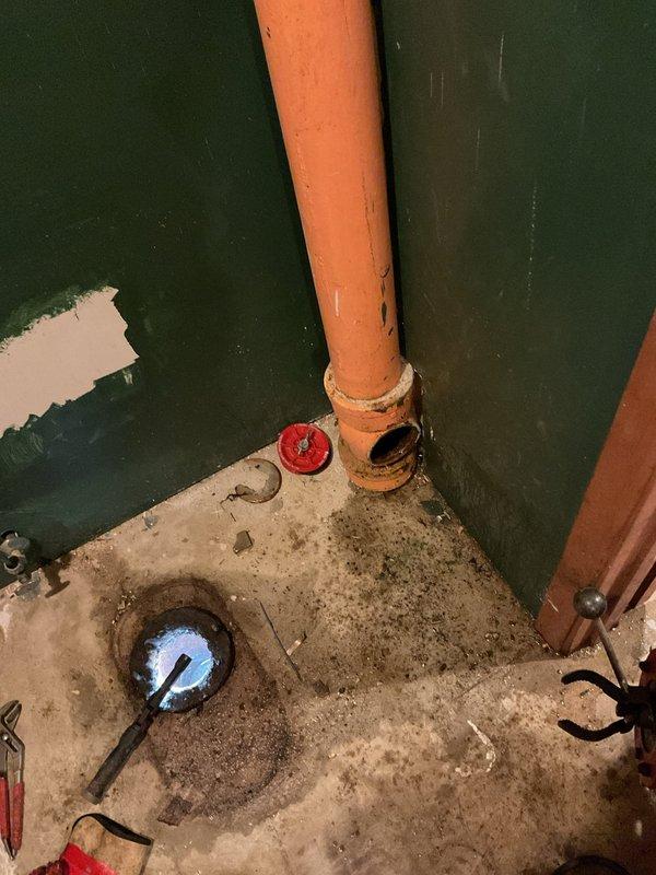 Responded to a basement drain backup in a 71-year-old residential property. Upon arrival, performed visual inspection of the drainage system and identified blockage in the main basement floor drain line. Utilized pipe threading and cleaning equipment to access and clear the obstruction in the aging cast iron drain system. Removed accumulated debris and sediment buildup that had developed in the drainage pipes over time. Tested water flow following clearance to confirm proper drainage function and verified no additional backup issues. System restored to normal operation with water flowing freely through the basement drain.