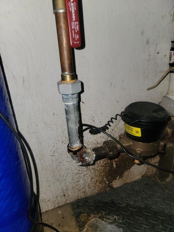 Completed VIP plumbing maintenance inspection and addressed toilet whistling issue caused by improperly seated flapper valve. Inspected water supply system including pressure relief valve, copper and galvanized piping connections, and sump pump assembly; noted significant corrosion and mineral deposits at pipe joints requiring future attention. Adjusted toilet flapper to eliminate high-pitch whistle and verified proper operation of all plumbing fixtures.