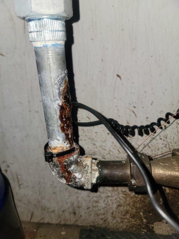 Completed VIP plumbing maintenance inspection and addressed toilet whistling issue caused by improperly seated flapper valve. Inspected water supply system including pressure relief valve, copper and galvanized piping connections, and sump pump assembly; noted significant corrosion and mineral deposits at pipe joints requiring future attention. Adjusted toilet flapper to eliminate high-pitch whistle and verified proper operation of all plumbing fixtures.